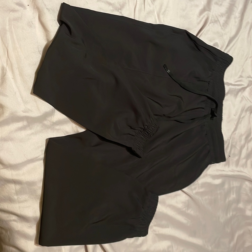 Black Mono B joggers in a size M